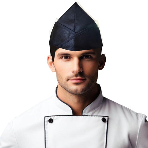 Black Chef Garrison Hat worn by a male chef, featuring a durable design and adjustable fit for kitchen professionals.